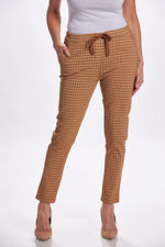 Front image of camel houndstooth printed pants. Made in italy pull on pants. 