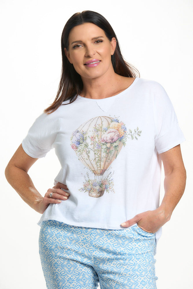 Front image of white tee shirt in hot air balloon print. 