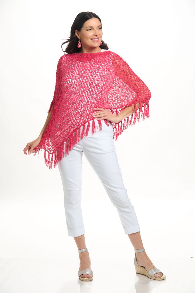 Front image of lost river fringe popcorn poncho in hot pink. 
