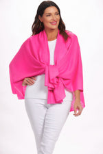 Front image of magic scarf loop and pull through wrap. Hot pink cardigan. 