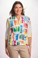Front image of impulse rainbow printed top. 