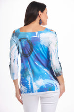 Back image of Impluse 3/4 sleeve print cold shoulder top. Blue printed made in the USA top. 