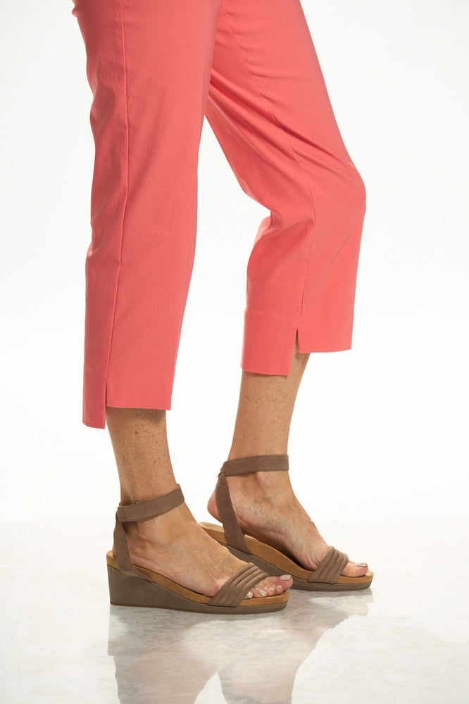Side detail image of UP! coral high/low capri. 