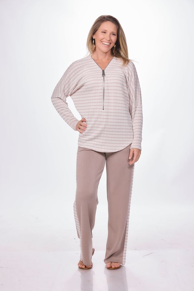 Front image of long sleeve zip front striped sweater.