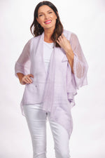 Front image of lavender lightweight knit ruana. The magic scarf company shawl. 