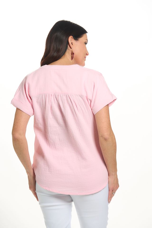 Back image of Lulu B short sleeve gauze top in clear pink. 