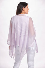 Back image of lavender lightweight knit ruana. The magic scarf company shawl. 