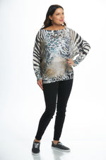 Front image of look mode cheetah and zebra printed sweater. Long sleeve top. 