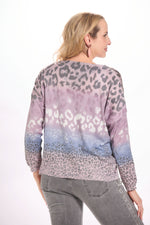 Back image of look mode long sleeve v-neck foil sweater. 