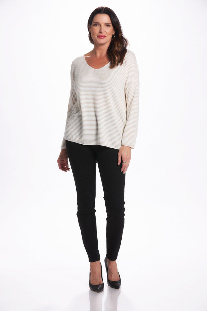 Front image of long sleeve v-neck lurex sweater. White and gold striped sweater. 