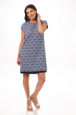 Front image of Mimozza printed cap sleeve dress. Navy printed short sleeve dress. 