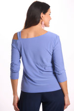 Back image of Mimozza one shoulder top. Peri solid blue top. 