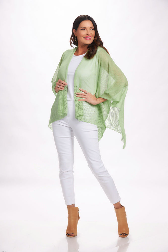 Front image of the magic scarf lightweight knit ruana. Mint green shawl. 