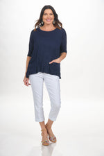 Front image of Shana navy crinkle top with pockets. 