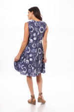Back image of Shana crinkle dress. Navy printed dress with front seam. 