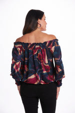 Back image of Last Tango navy multi off the shoulder top. Date night out top. 