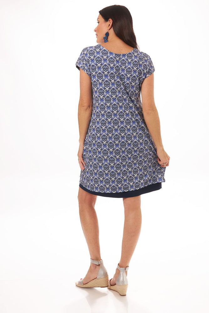 Back image of Mimozza printed cap sleeve dress. Navy printed short sleeve dress. 