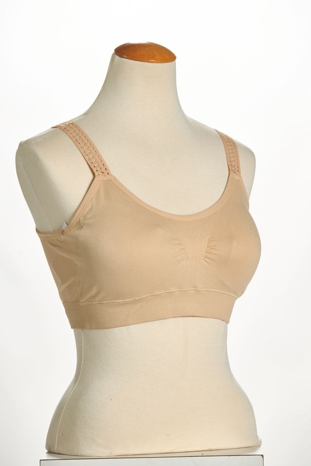Front image of strap its nude lattice bra. 