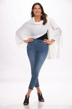 Front image of off white loop pull through wrap. White open front cardigan. 