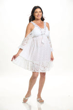 Front image of la moda white open shoulder dress. 