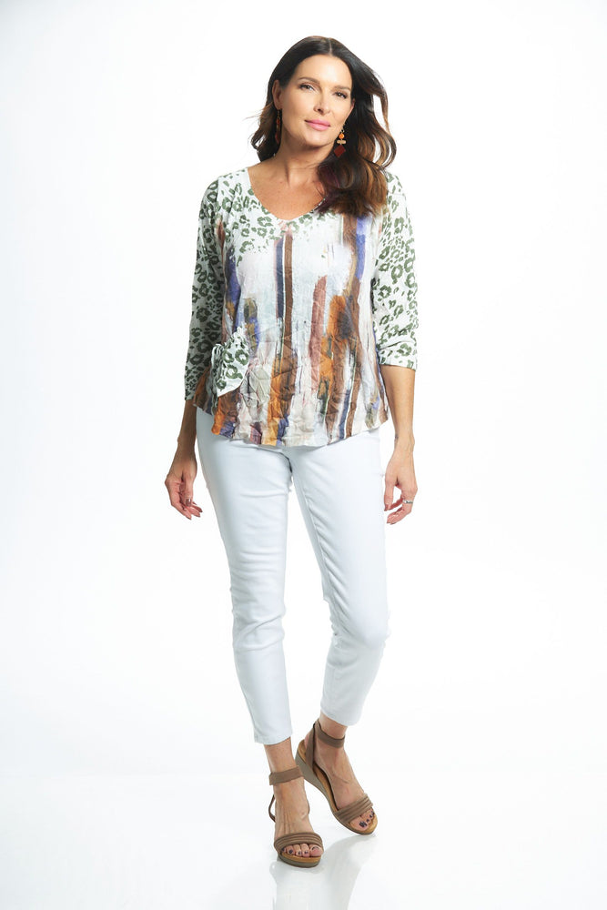 Front image of 3/4 sleeve v-neck top with pocket. Animal printed fall top. 