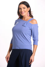 Side image of Mimozza one shoulder top. Peri solid blue top. 