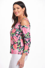 Side image of Mimozza one shoulder top. Black and pink floral print top. 