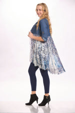 Side image of long sleeve button front jacket with tulle. Denim and tulle jacket by origami. 