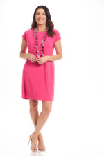 Front image of Mimozza reversible cap sleeve dress. Pink dress. 