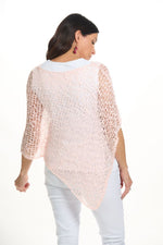 Back image of lost river popcorn poncho in light pink. 
