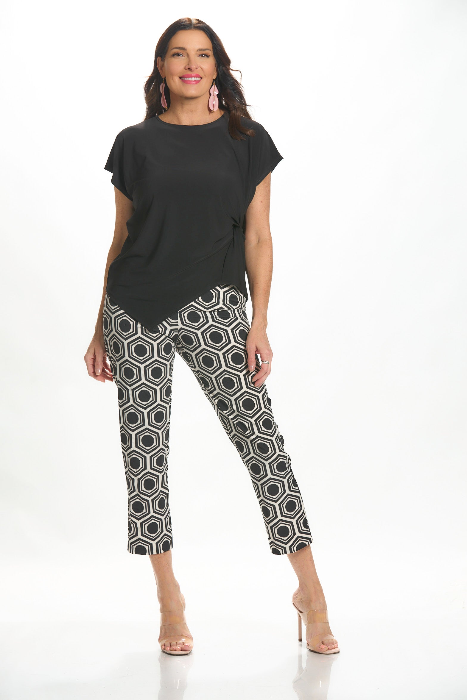 Front image of Krazy larry crop feather weight pant in hexagon print. 