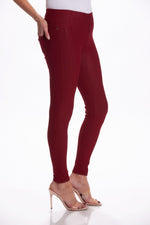 Side image of burgundy ankle denim leggings. Denim pull on leggings. 