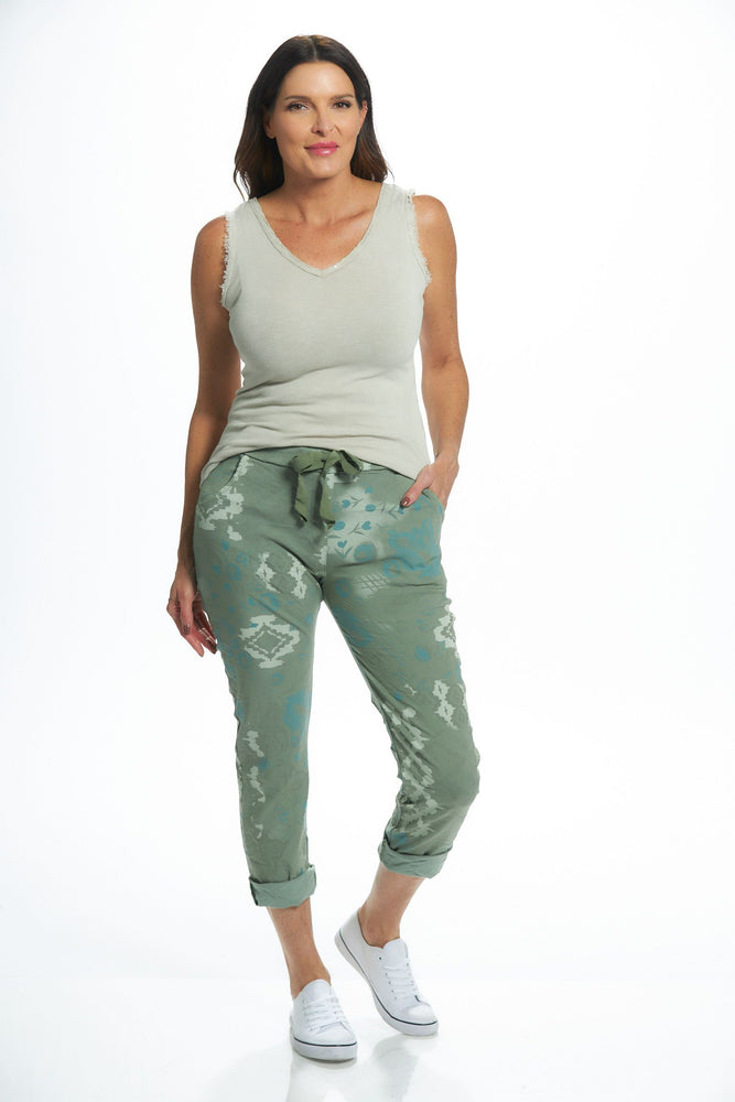 Front outfit image of pull on heart printed pants in olive. Made in italy one sized pant. 