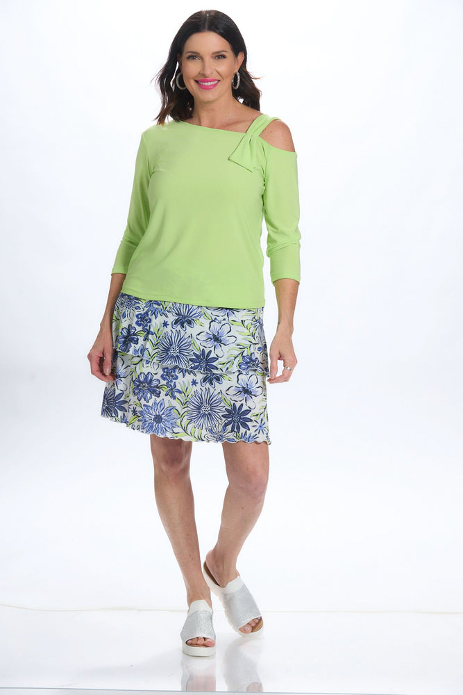 Front image of pull on ruffle skort in blue flower print. 