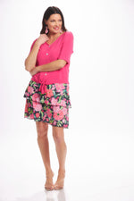 Front image of Mimozza short sleeve v-neck button front tie top. Bright pink destination collection top. 