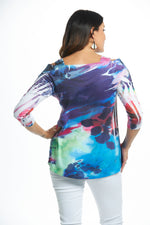 Back image of purple passion printed cold shoulder top. 