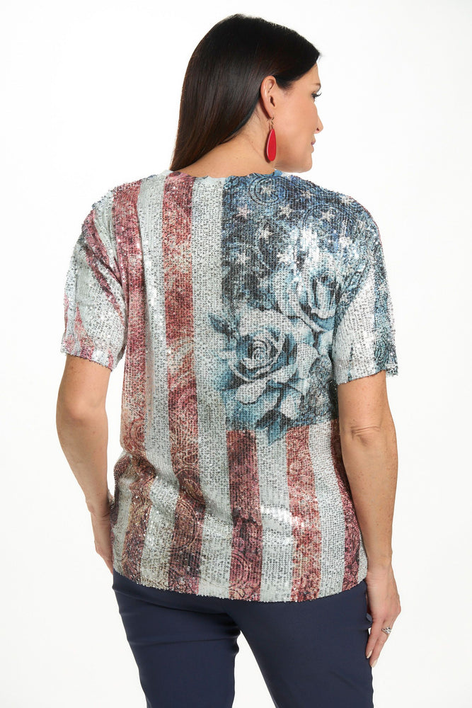 Back image of short sleeve tee with sequins in flag and rose print. 