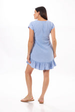 Back image of Giocam ruffle dress. Short sleeve dress with pockets. 