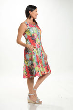 Back image of sleeveless crinkle dress with pockets. 