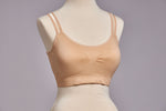 Front image of strap-its bra plus size. Nude sheer strap bra. 