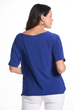 Back image of dolman sleeve royal blue top. Short sleeve top. 
