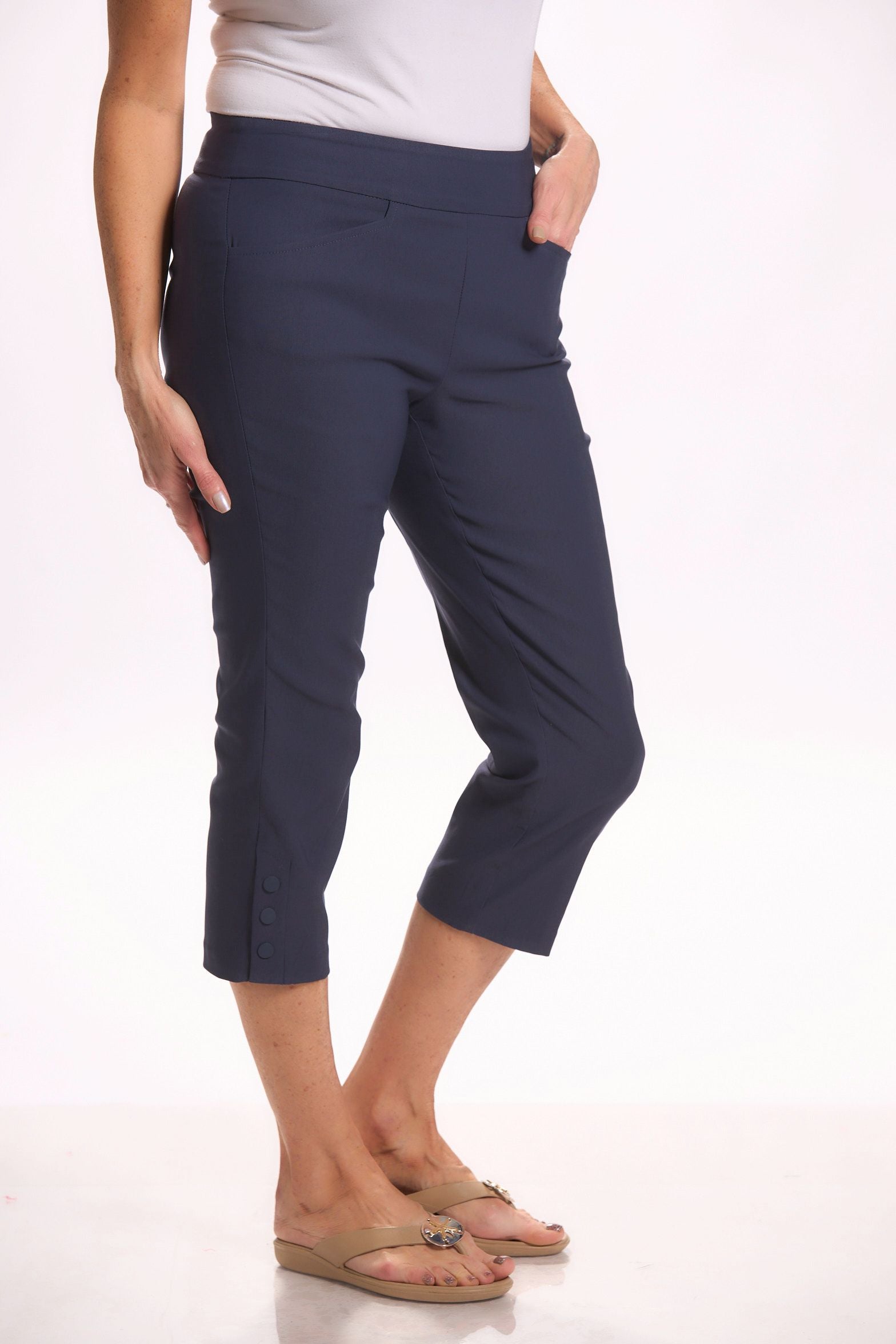 Side image of Tribal side snap capri in deep blue. 