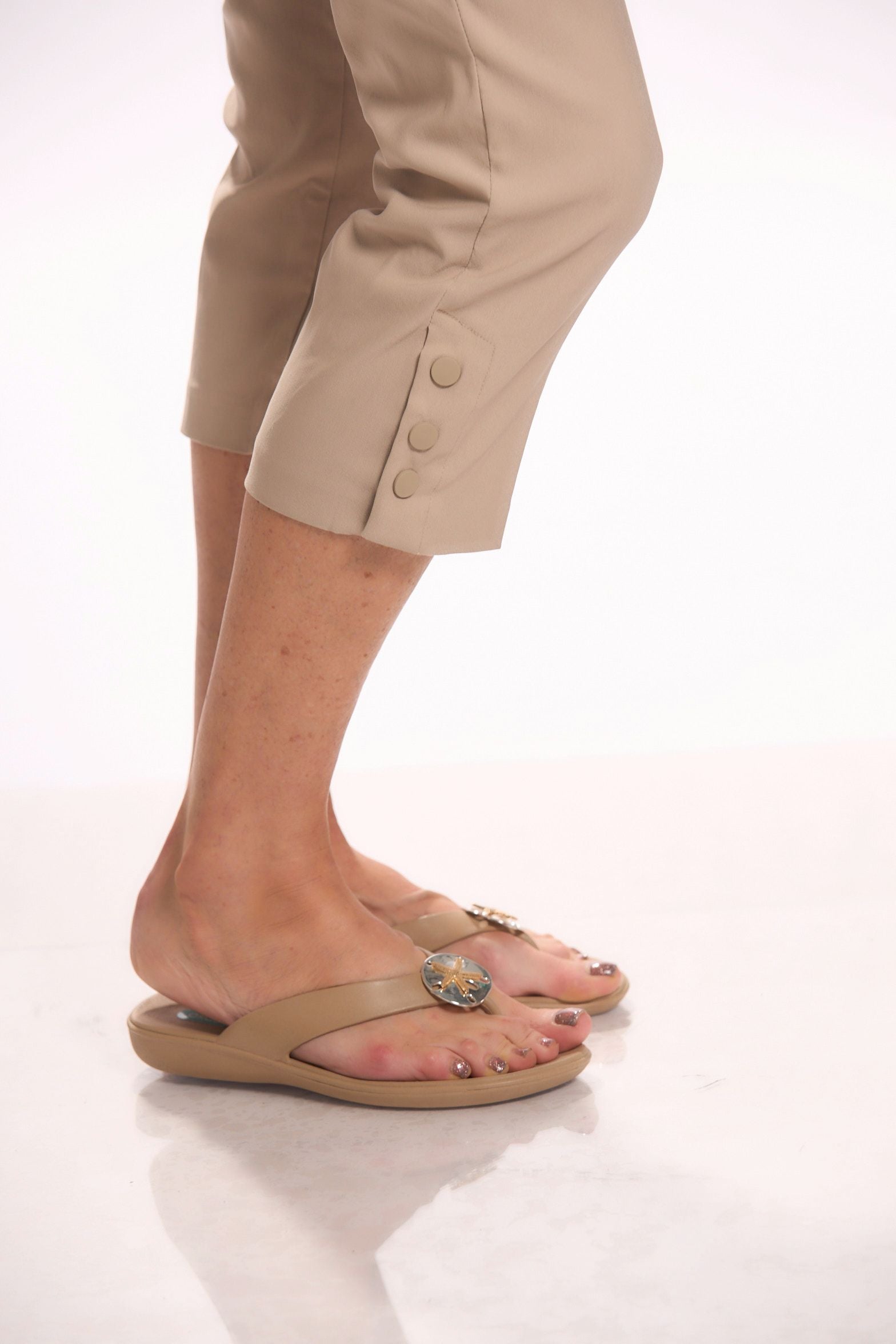 Front detail image of Tribal sahara tan snap capri bottoms. 