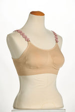 Front image of strap its bra in suede blush flowers. 