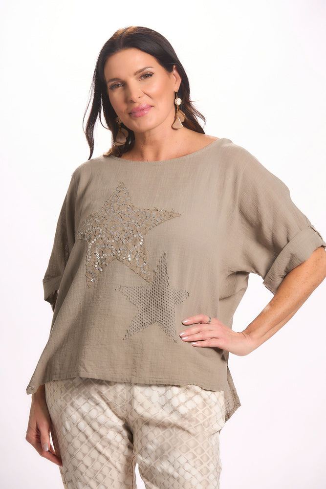 Front image of Catherine lily white taupe star top. 