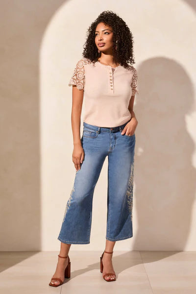 Front image of Tribal embroidered denim pant.