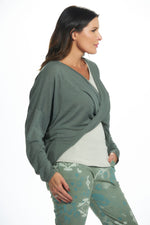 Side image of look mode twist front sweater. Olive green one sized top. 