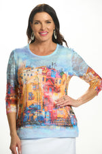 Front image of Fashion Cage 3/4 sleeve village print top. 