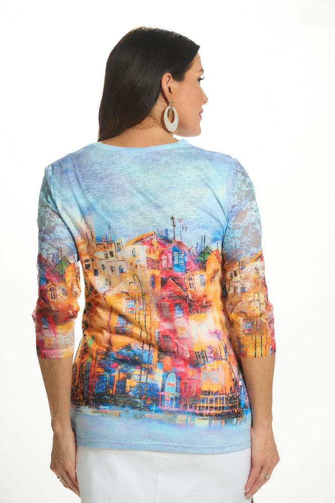 Back image of Fashion Cage 3/4 sleeve village print top. 