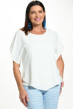 Front image of last tango short sleeve air flow top. 